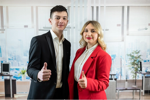 employees giving thumbs up